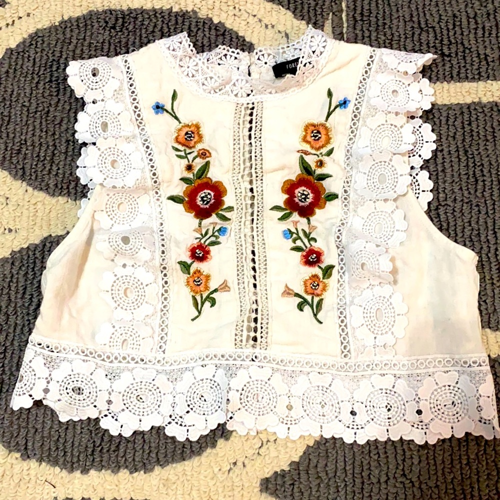 A cropped blouse.